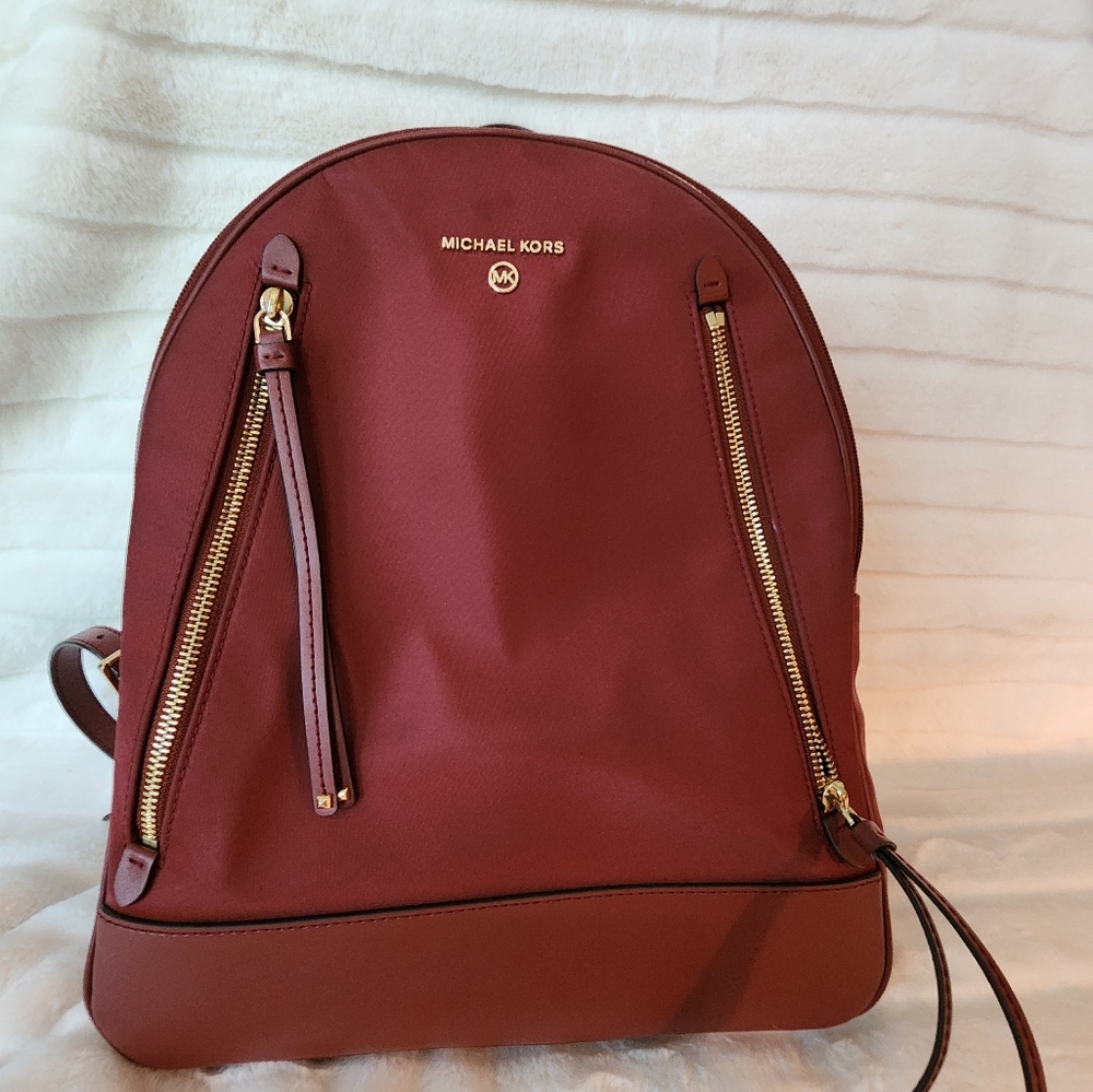 Michael Kors Red Backpack with Structured Design and Gold Accents